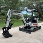 Bobcat 425G (2008) – miniexcavadora de ocasión de 2,7 t – 2.095 h – 4 cazos