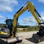 Miniexcavadora de ocasión New Holland E50B SR (2012) – 5,1 t + remolque