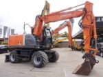 Excavadora de ruedas Hitachi ZX140W 2008 – 14,7 t – 5.410 h – ocasión