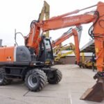 Excavadora de ruedas Hitachi ZX140W 2008 – 14,7 t – 5.410 h – ocasión