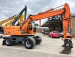 Excavadora de ruedas Doosan DX140W 2010 – 14,8 t – 7.857 h – ocasión