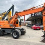Excavadora de ruedas Doosan DX140W 2010 – 14,8 t – 7.857 h – ocasión