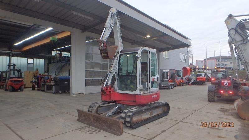 Takeuchi-153-011.jpg Takeuchi de ocasión 153 FR (2008) – miniexcavadora de 5,6 t – 5.225 h – 3 cazos - Imagen 1